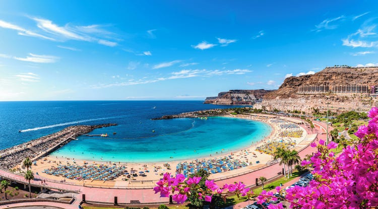 Breathtaking view of Amadores Beach, featuring clear blue waters, sandy shores, and vibrant coastal surroundings.